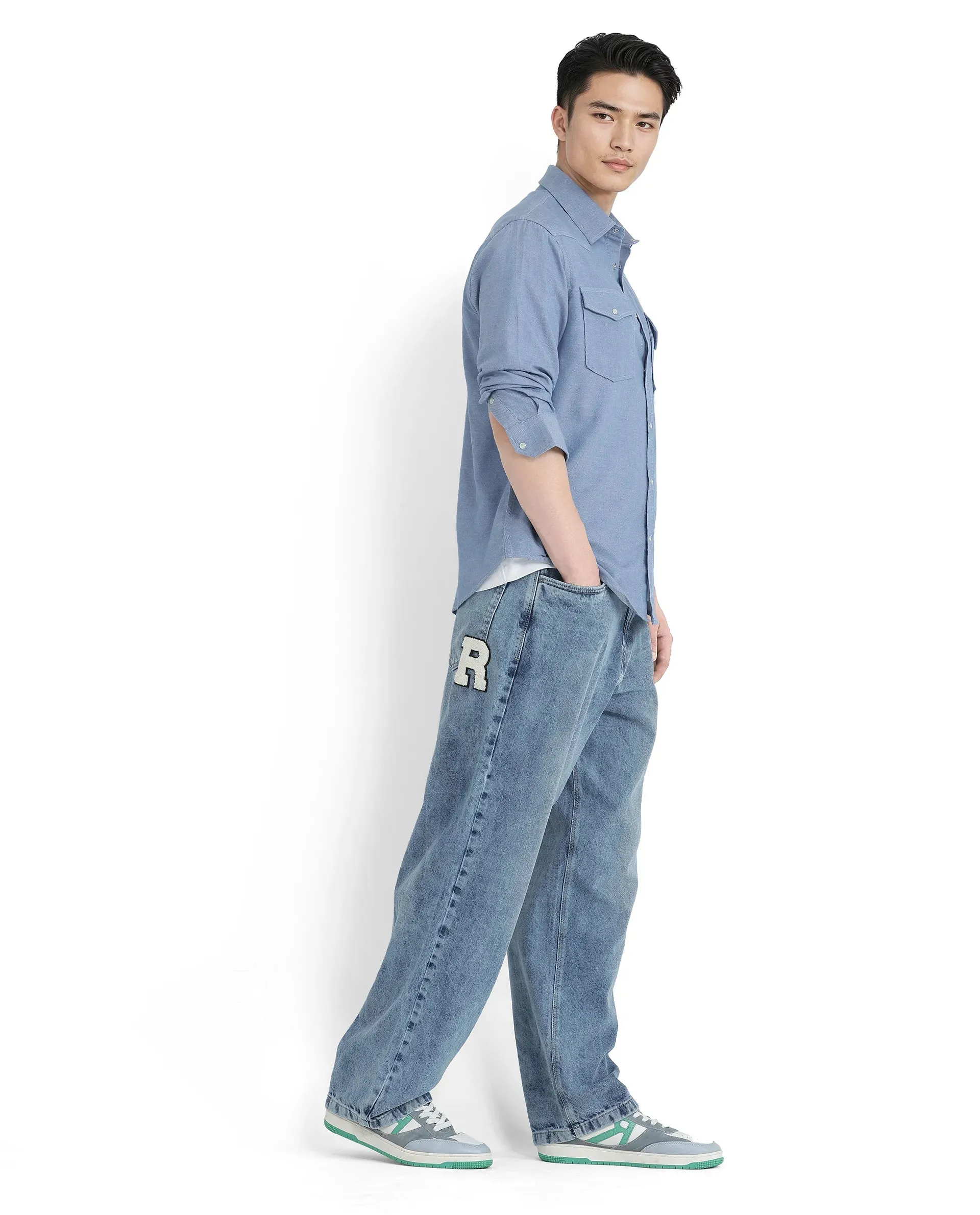 Rare Rabbit Men Riffin Light Blue Cotton Fabric Button And Zip Closure Baggy Fit Plain Jeans